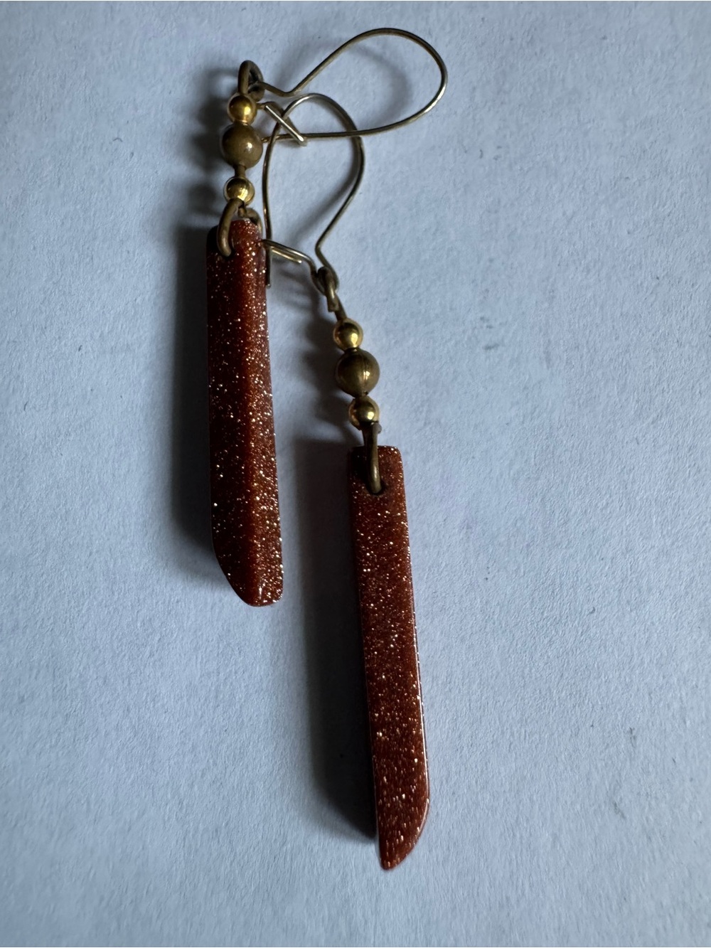 Goldstone Dangle Earrings - Gold tone shepherd hooks